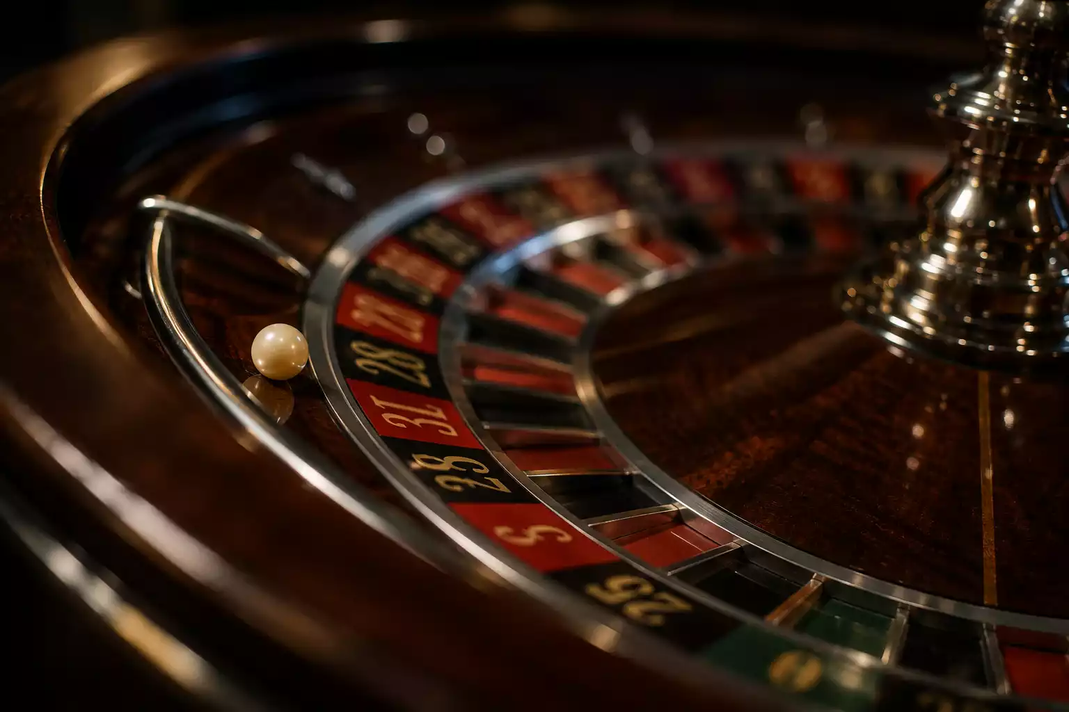 Live roulette wheel spinning in professional casino studio setting